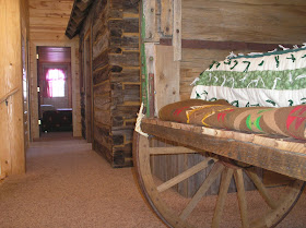 Nauvoo Log Cabins Covered Wagon Bed In The Weary Traveler Lodge