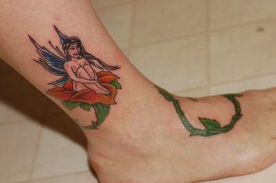 Fairy Sitting on a Flower Tattoo
