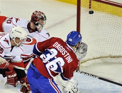 [capt_31b7eb4be01c41f4bec7c3fe1ade6e52_hurricanes_canadiens_hockey_gmh105.jpg]