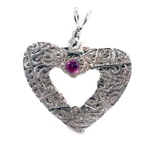 fine silver heart with pink cubic zirconium