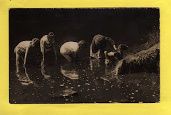 Kids have enjoyed fishing for tiddlers for generations.  This picture is more than 70 years old