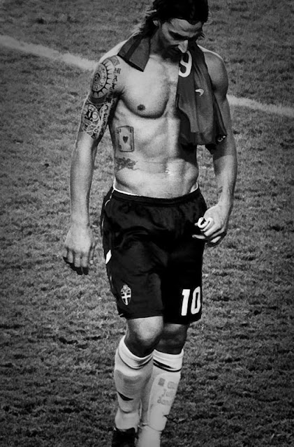 Marco Materazzi with a full tribal tattoos on arm tattoos, and hand tattoos Marco Materazzi with a full tribal tattoos on arm tattoos, and hand tattoos