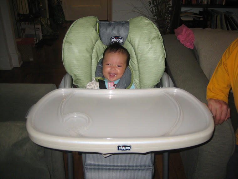 Trying out my high chair for the first time.