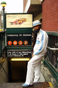 Wallabee Clarks,Polo sweatsuit,Fedora wit the custom bandana.