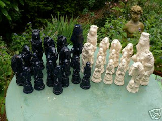 Hand-carved chess set — not sure what the pieces are made of, maybe ivory?  looking for cleaning tips! : r/CleaningTips