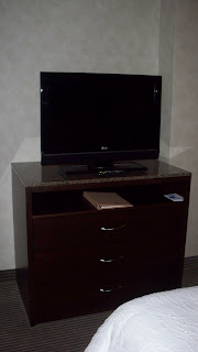 a tv on a dresser