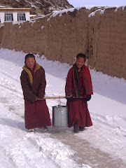 novices carrying water