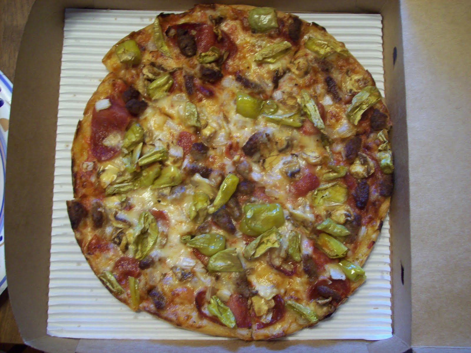 There's god in that food! PizzapaloozaPaul's Pizza Falmouth MA