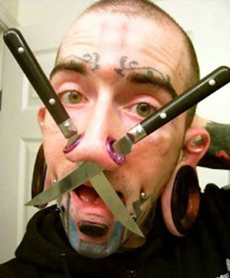 20 Strange Tattoos and Ugly body modifications