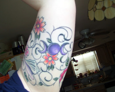 Here is the underside of my tattoo (triple moon and a seashell):