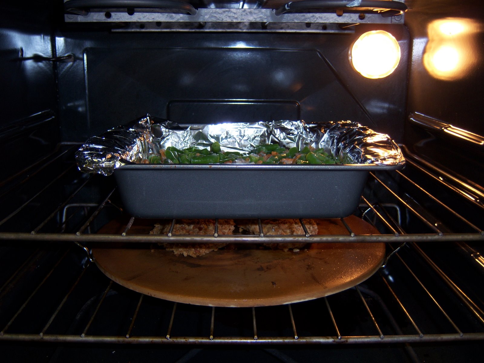 [thanksgiving+dinner+in+the+oven.JPG]
