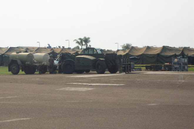 some tents and military equip on base