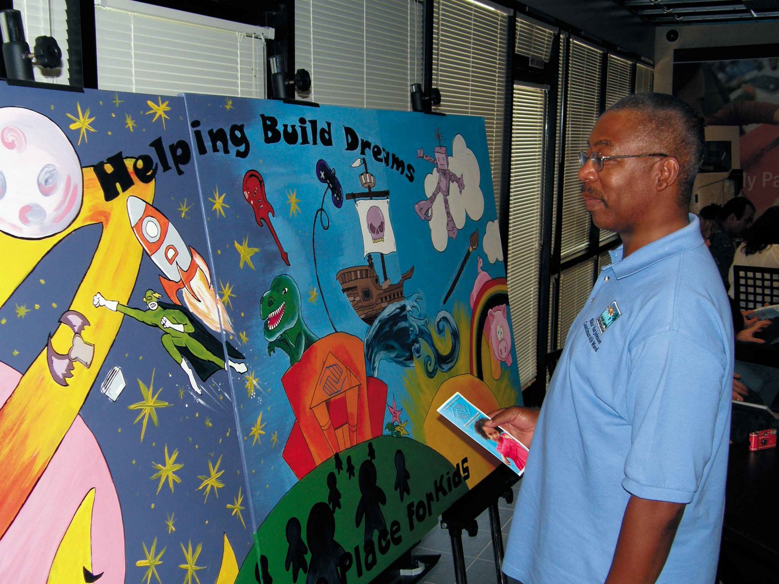 [Mural-and-instructor-low-re.jpg]