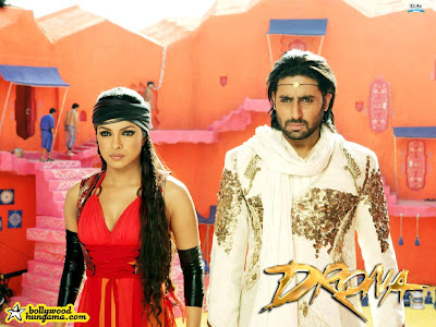 http://1.bp.blogspot.com/_KcLDZ-f7uFc/SOTAGN3ePsI/AAAAAAAAAEU/nW75cCs0XVk/s400/Drona-Abhishek+Bachchan-Priyanka.jpg