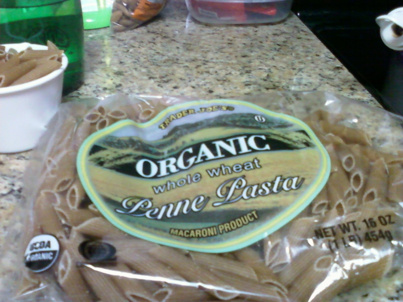 Yummies Sausage and tomatoes over whole wheat penne pasta