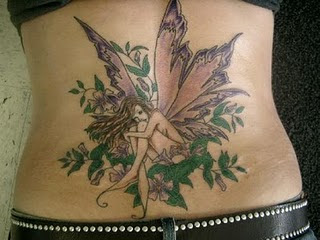 Women+tattoos+on+belly