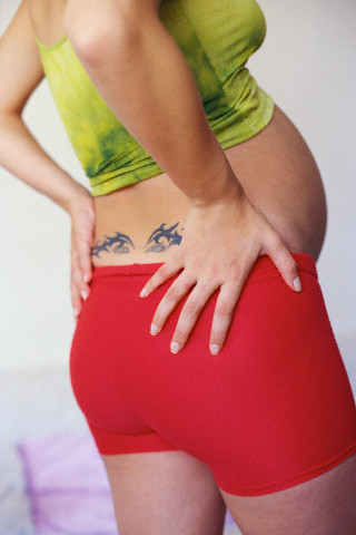[Lower_Back_Tribal_Tattoo.jpg]