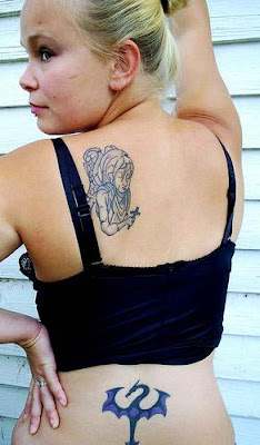 Cross Lower Back Tattoo