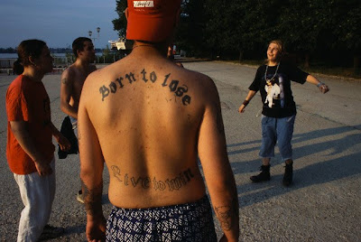 writing tattoos on back