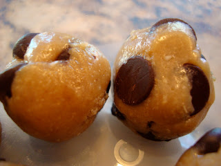 Close up of two Raw Vegan Chocolate Chip Cookie Dough Balls