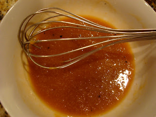 Maple Ginger Dijon Vinaigrette with whisk in bowl