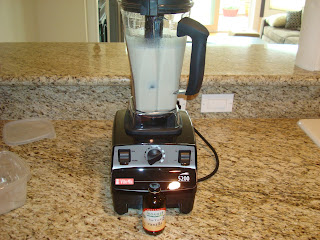 Banana blended with coconut milk and sweetener in high powered blender