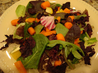 Greens salad with diced vegetables and Dulse flakes