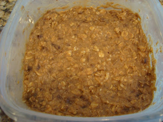 Breakfast cookie ingredients mixed together in clear container