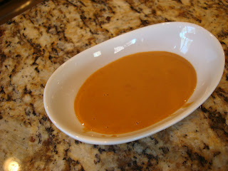 Peanut Sauce in oval shaped bowl on countertop