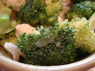 Broccoli and Cauliflower Recipe with homemade dressing in bowl