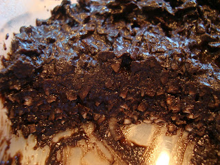 Scoop taken out of Dark Chocolate Coconut Snowballs batter