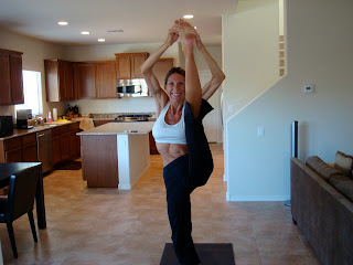 Woman doing Standing Splits yoga pose