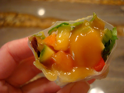 Close up of peanut sauce on spring roll