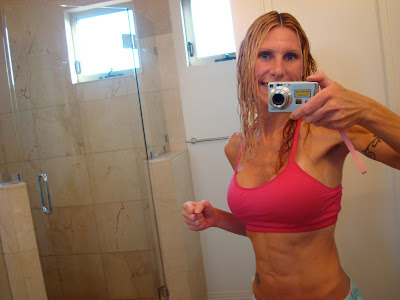 Woman showing off toned abs