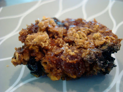 One Blueberry Streusel Muffin on plate