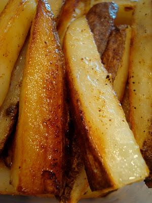 Close up of Coconut & Olive Oil Roasted Potato Sticks on plate