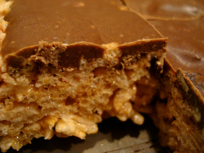 Close up of GF Vegan "Rice Krispie" Treats with Chocolate Peanut Butter Coconut Oil Frosting