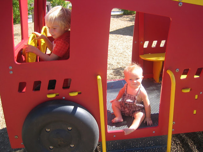 Kolton and Krew in the fire truck