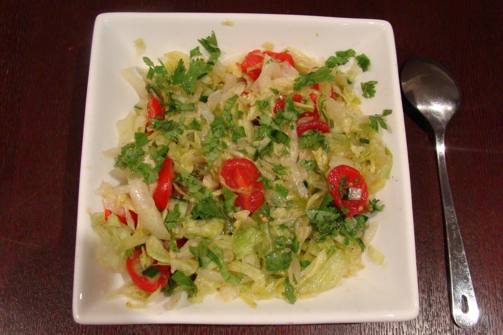 palate corner lettuce and cherry tomato salad with tangy lemon dressing