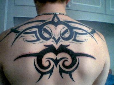 Tribal Tattoo at The Man Sexy Body With Art Designs