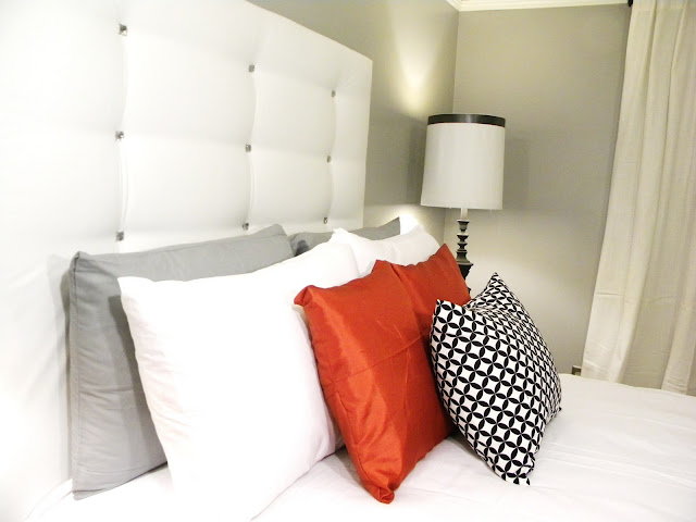 DIY tufted headboard. Super easy to make with the faux tufts and all for under $20!