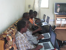 customers using their laptops at the centre