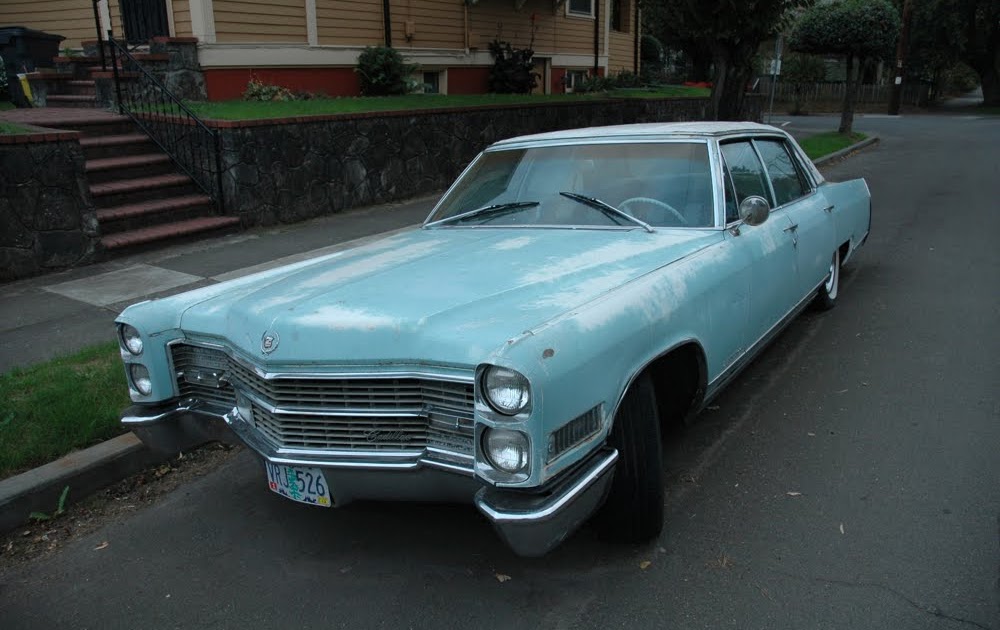 OLD PARKED CARS.: 1966 Cadillac Fleetwood Brougham.