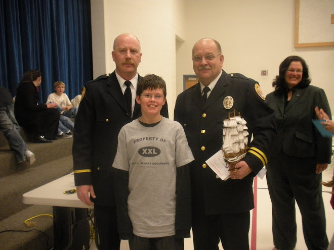 Konner with the N.O.V.A. officers