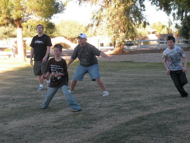 the guys playing games in grandma's front yard