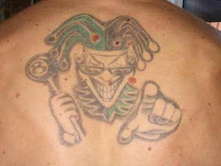 He had a Joker's Card influenced tattoo 