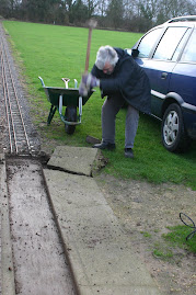 I wouldn't let him break concrete that close to my car.