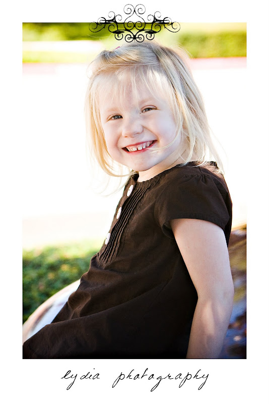 Little girl sitting on the bench at lifestyle kids portraits in San Antonio, Texas