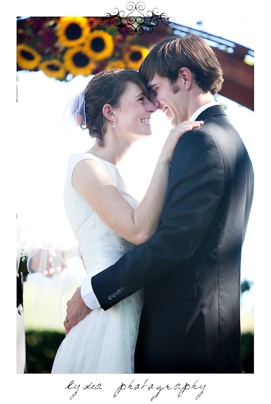 The bride and groom full of joy during the ceremony at a Kenwood Farms & Gardens wedding