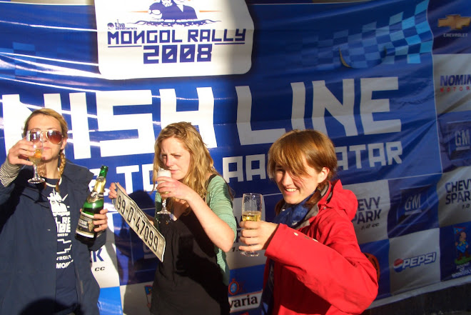 Team Soyombo get bevvied at the finish line, Ulaanbaatar, Mongolia!